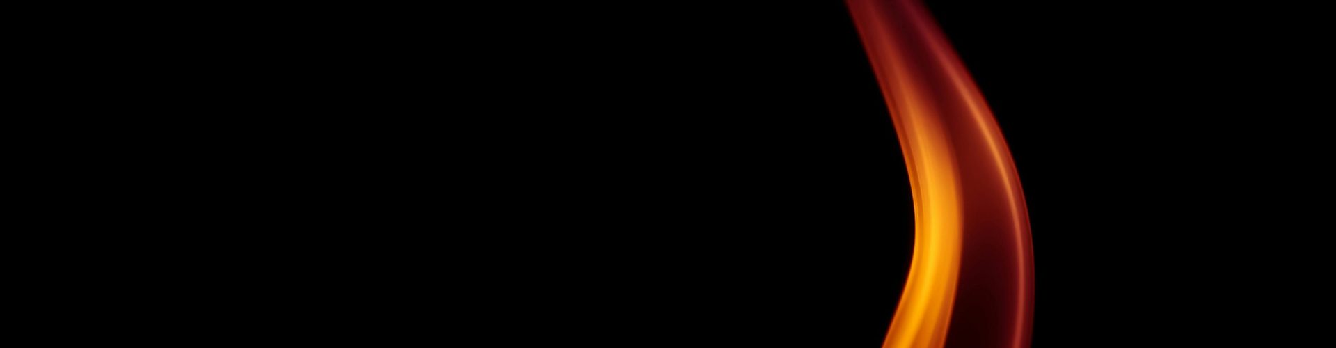 A striking image of a single flame with elegant curves against a black backdrop.